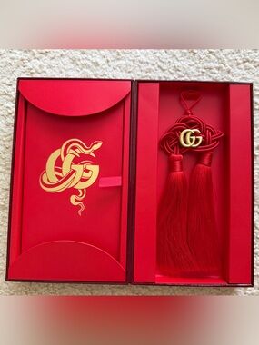 Gucci Chinese New Year box with red envelopes